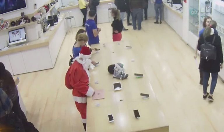 Позитивный Санта-Клаус украл 12-дюймовый MacBook из магазина