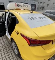 Московские таксисты защищаются от пассажиров экраном из прозрачной пленки